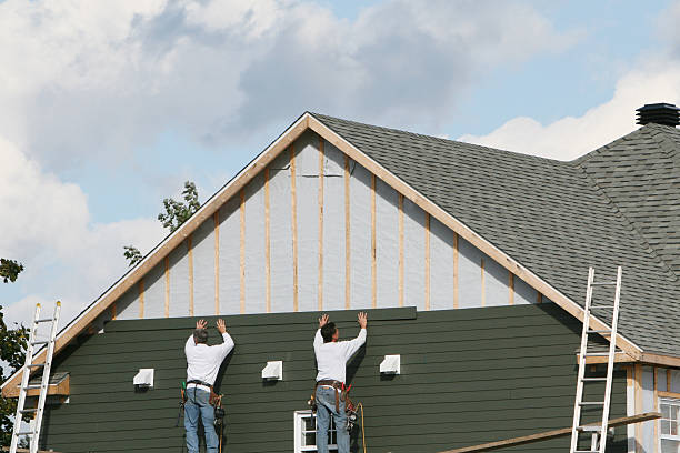 Professional Siding Contractor technician working in Adamstown, MD
